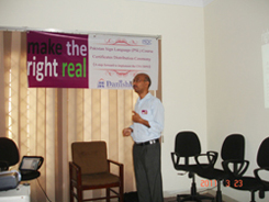 Mr. Akram giving a presentation