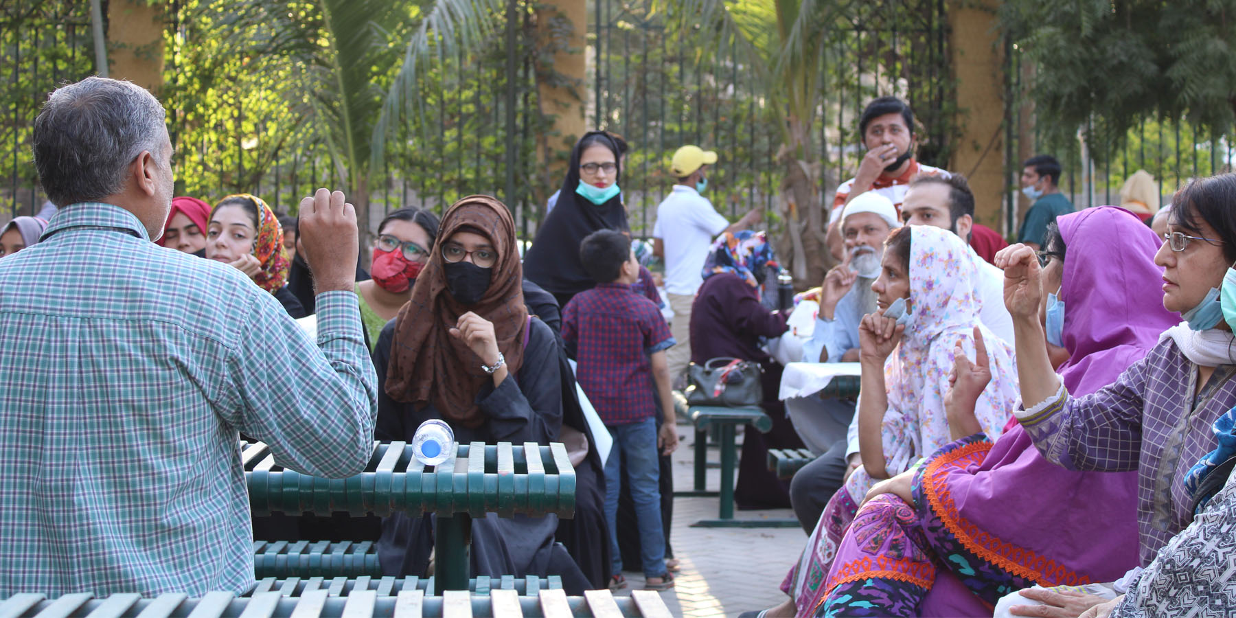 Listening with hand on ear